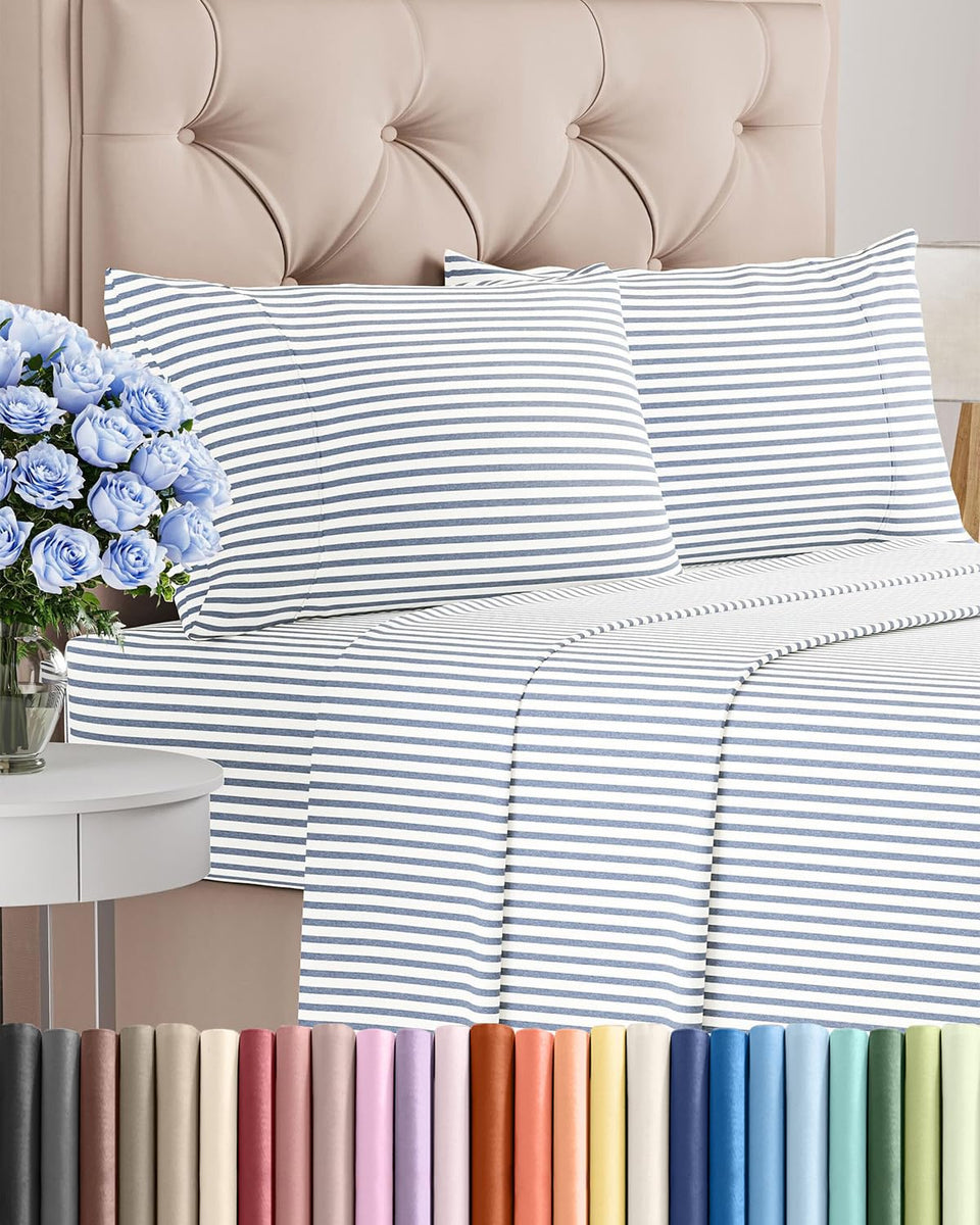 CGK Unlimited queen sheet set in blue stripes covering bed, enhances cooling and style.