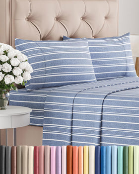 CGK Unlimited queen sheets blue stripes flat lay showing soft, breathable comfort.