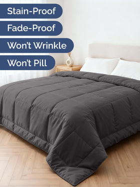 CGK Unlimited comforter draped in a cozy bedroom for all-season use