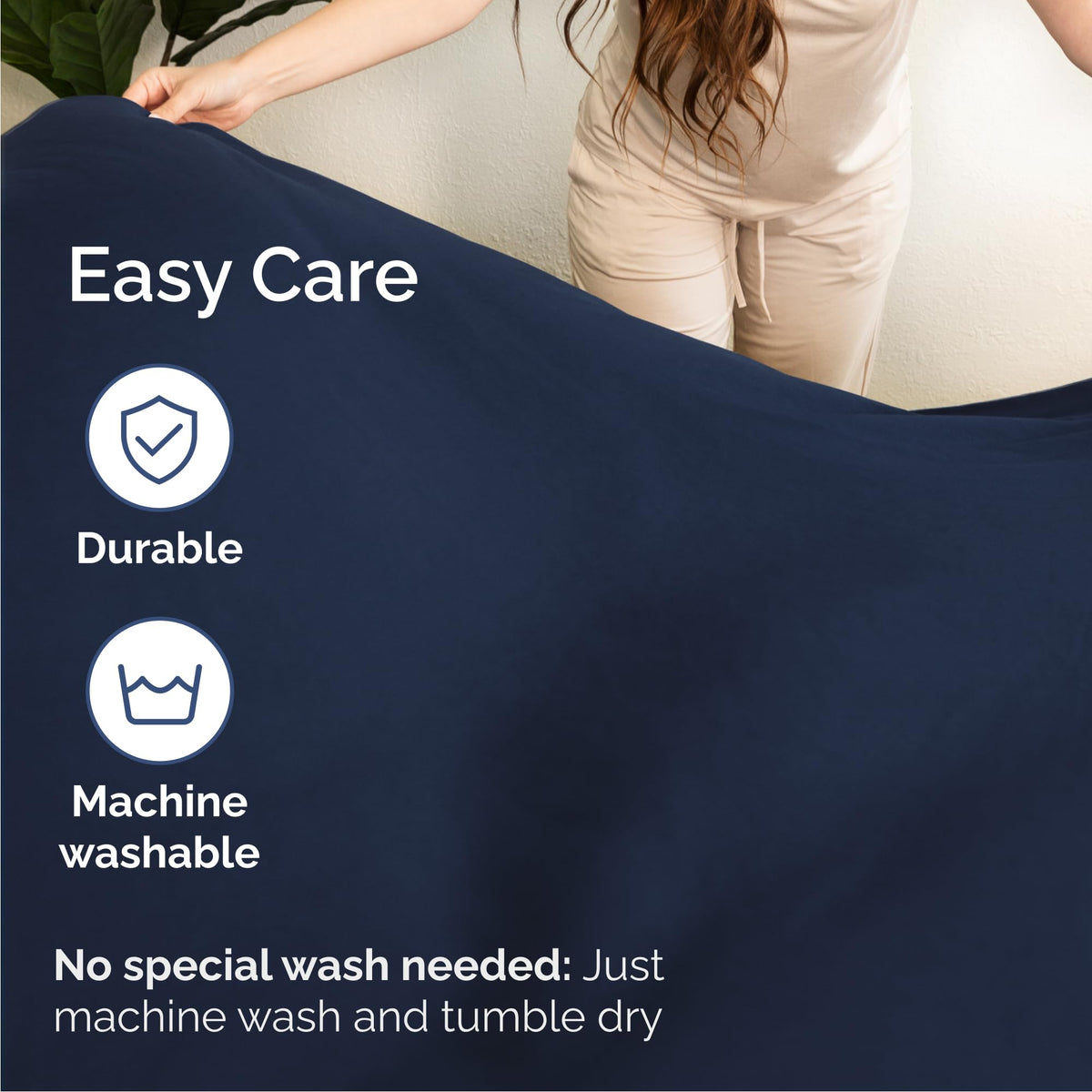 CGK Unlimited wrinkle-free navy sheets help keep your bed neat.
