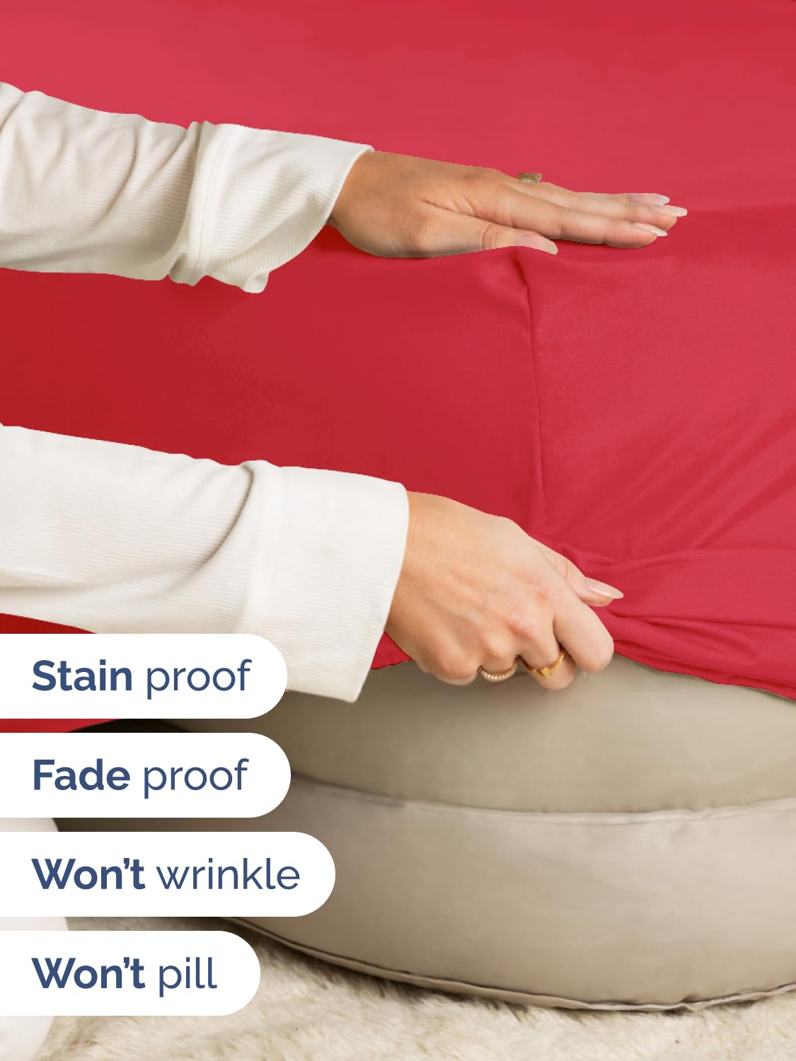 Elastic edge around CGK Unlimited red queen fitted sheet grips the mattress securely