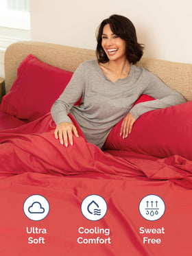 Red CGK Unlimited queen fitted sheet appears wrinkle-free and breathable on mattress