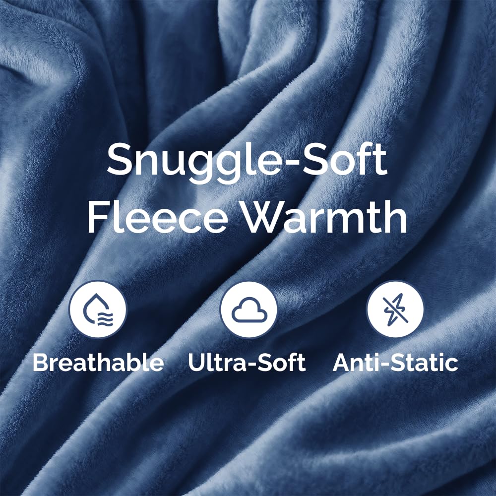 cgk unlimited royal blue blanket draped on a couch for lounging.