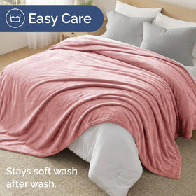 CGK Unlimited travel rose pink blanket is compact and easy to pack for trips