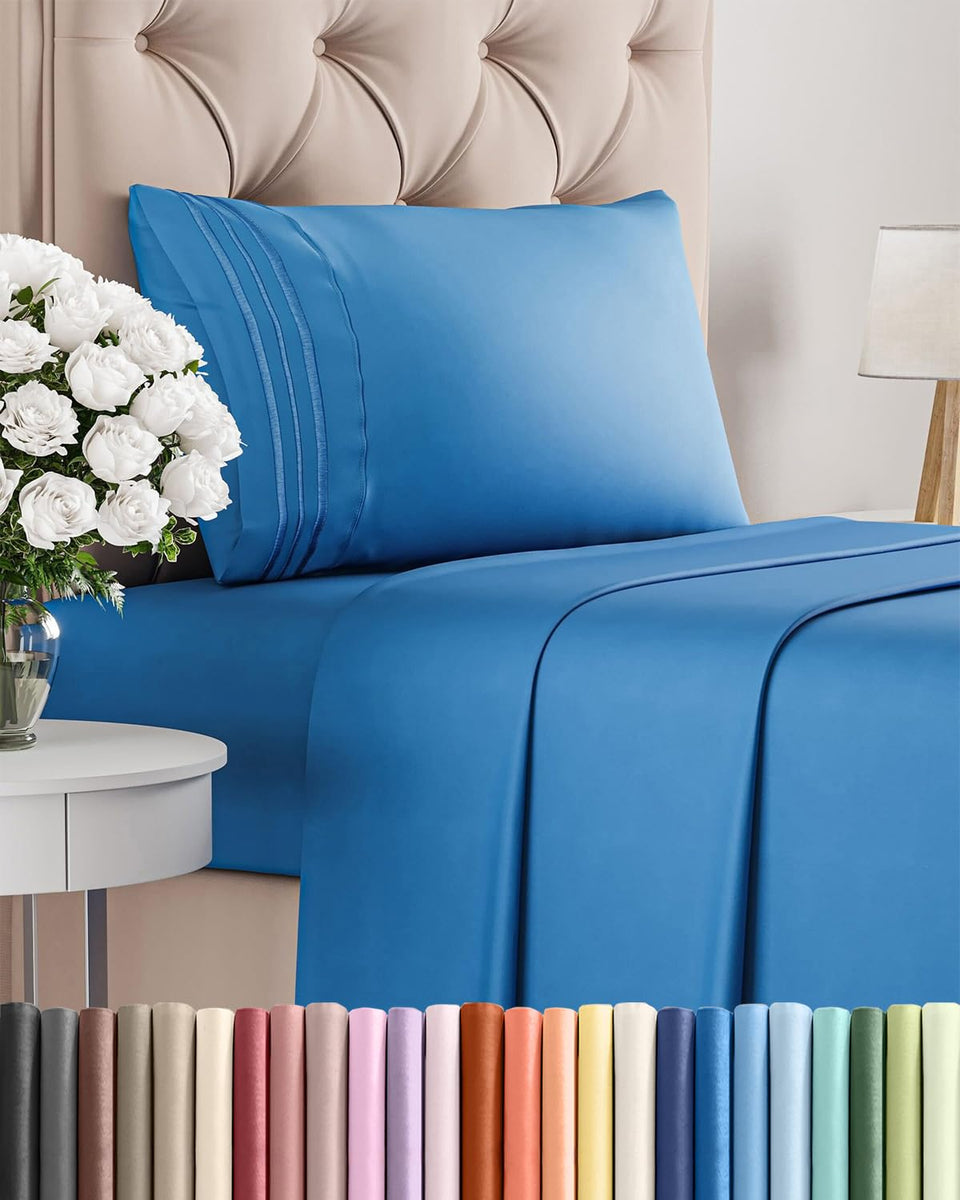 CGK Unlimited twin 3-piece sheet set flat sheet close-up shows ultra-soft blue fabric