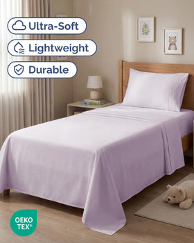 CGK Unlimited fitted sheet in light lavender fits up to 16-inch deep mattresses.