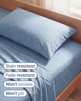 CGK Unlimited bed draped view shows silky-soft sheets that feel breathable and inviting.