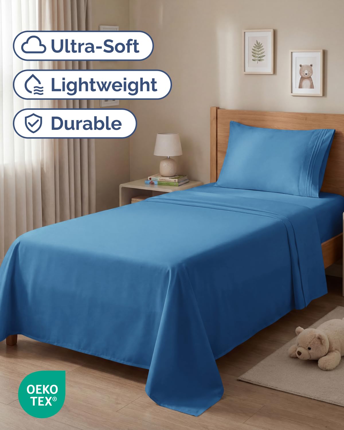 CGK Unlimited denim blue fitted sheet close-up highlights deep-pocket fit for thick mattresses.