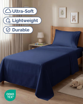 CGK Unlimited twin sheet set navy blue fitted sheet closeup demonstrates secure fit