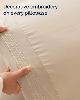 CGK Unlimited cream Twin XL sheet set on bed, hotel-like luxury vibe.