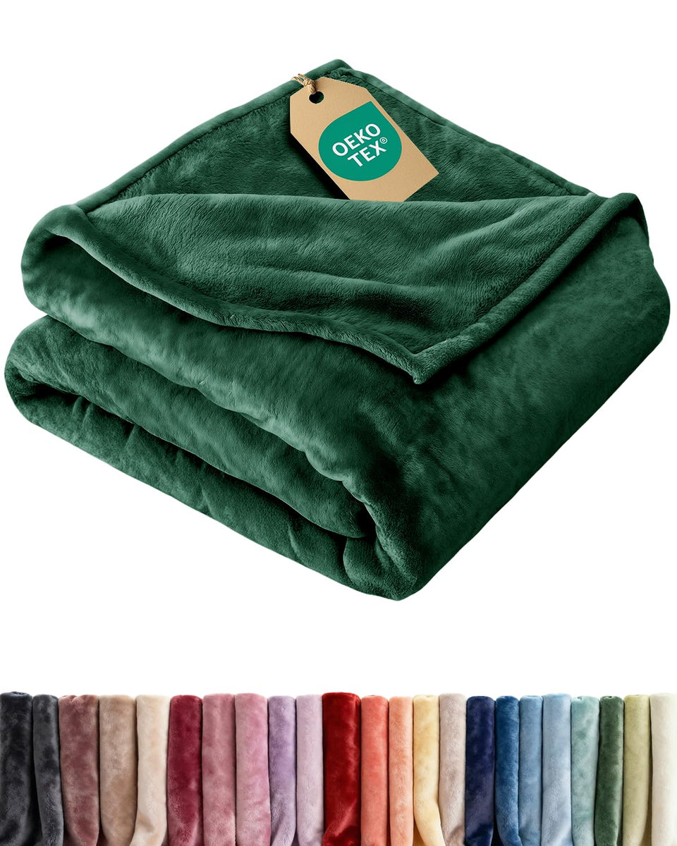 CGK Unlimited Ultra Soft Fleece Blanket Queen folded, plush texture for cozy evenings.