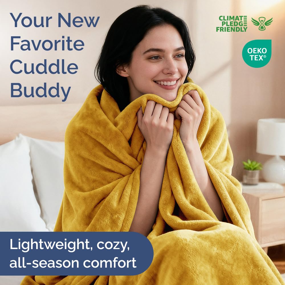 CGK Unlimited blanket on a couch adds warmth and style for cozy movie nights
