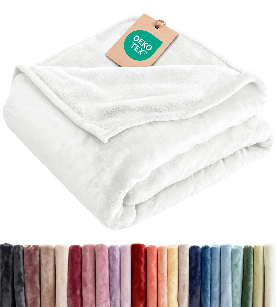 CGK Unlimited ultra-soft fleece blanket texture close-up for cozy evenings on the couch