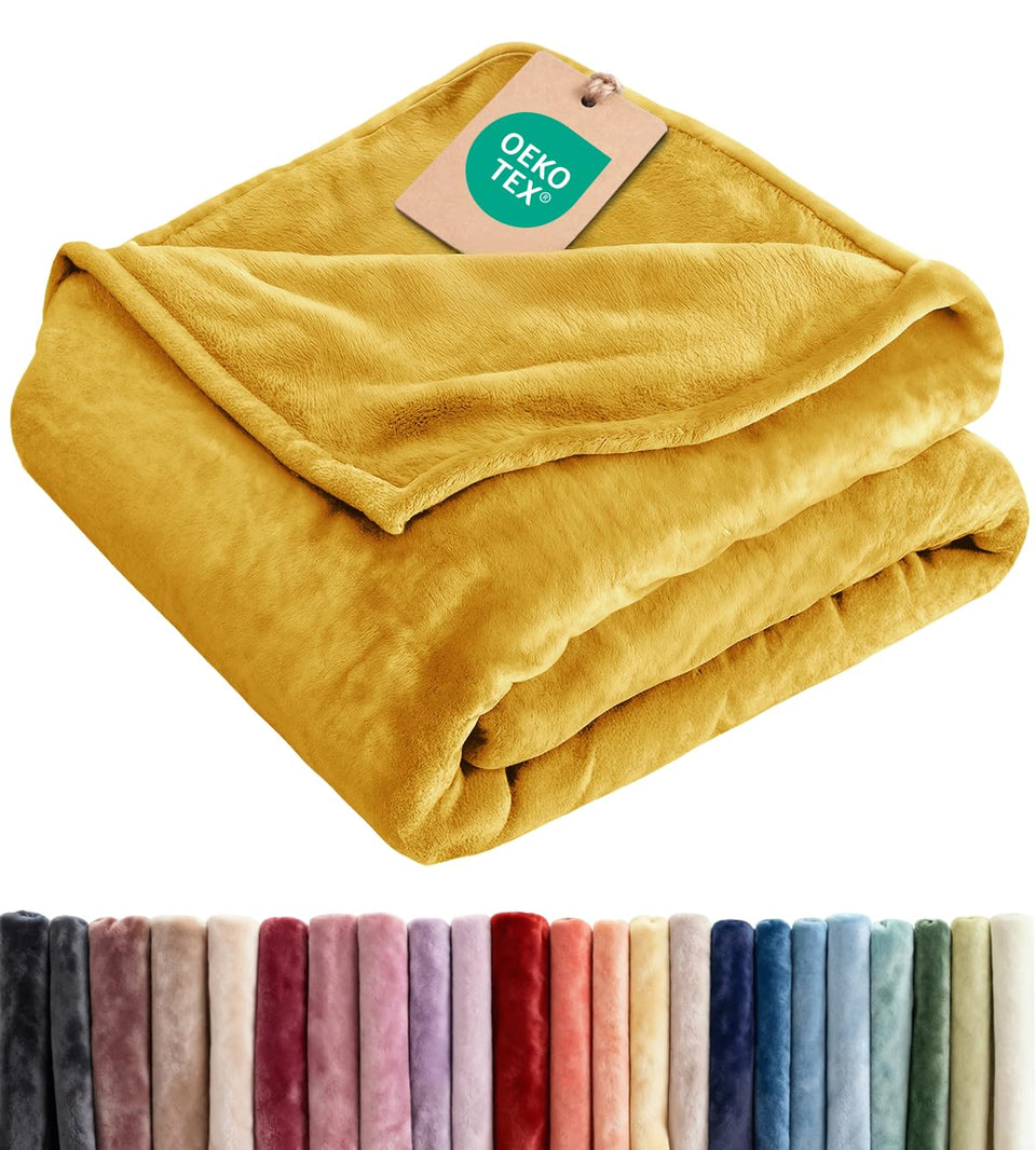 CGK Unlimited ultra-soft fleece blanket throw in gold, flat lay showing luxurious texture