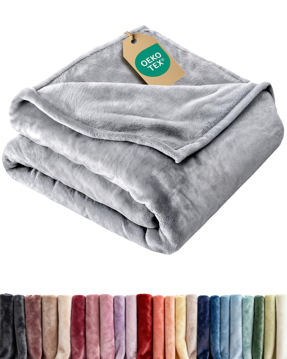 CGK Unlimited Ultra Soft Fleece Twin blanket folded on bed, inviting cozy evenings.