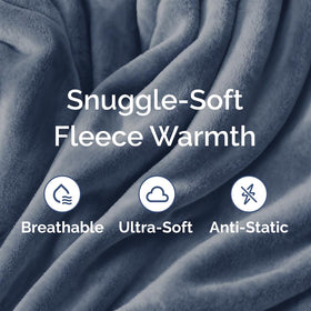 CGK Unlimited washed blue blanket on bed mood-setting scene.