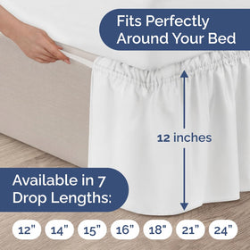 CGK Unlimited white bed skirt enhances bedroom decor with a clean finish.
