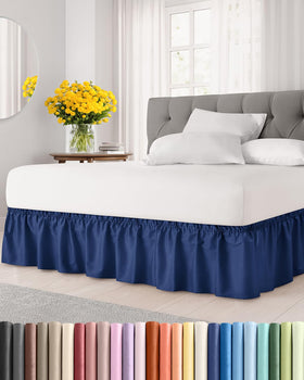 CGK Unlimited wrap-around bed skirt navy on king bed with 15-inch drop for a seamless look