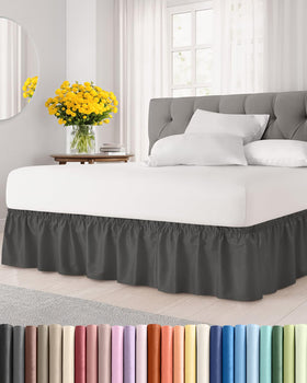 CGK Unlimited wrap-around dust ruffle on charcoal queen bed with 15-inch drop.