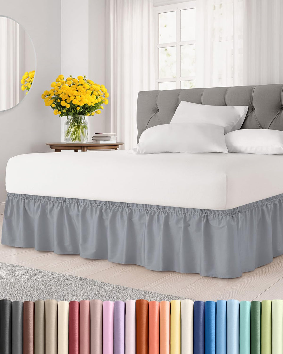 CGK Unlimited wrap-around bed skirt steel blue front view showing full coverage and drape