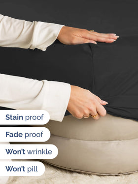 CGK Unlimited wrinkle-free black queen sheet on mattress