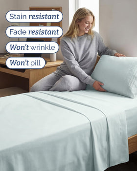 CGK Unlimited wrinkle-resistant hem seen on a neatly made bed.