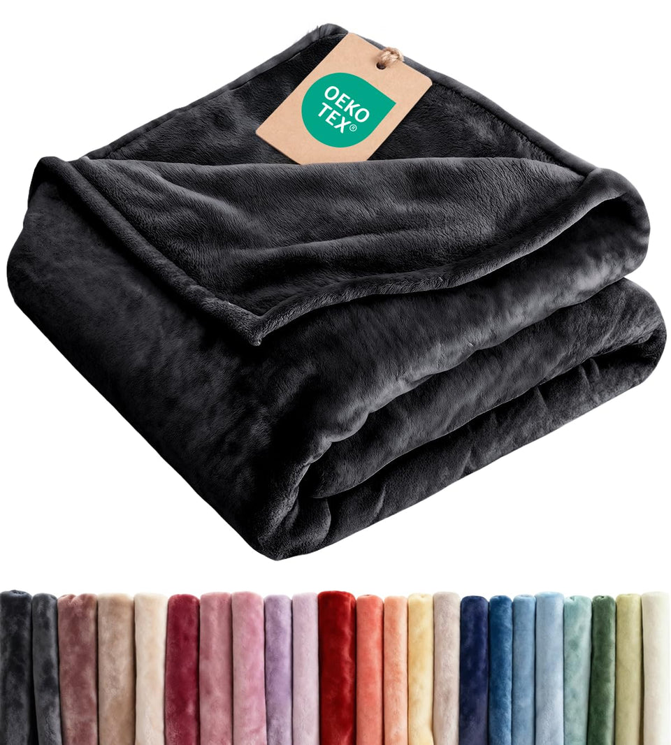 CGK Unlimited ultra-soft fleece blanket throw offers plush comfort for couch or bed.