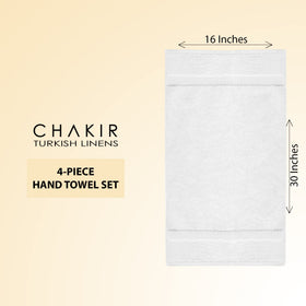 Chakir Turkish Linens four-piece hand towel set neatly stacked in white