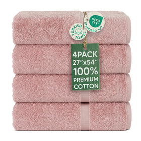 Chakir Turkish Linens 4-piece pink bath towel set in bathroom for spa-like comfort.
