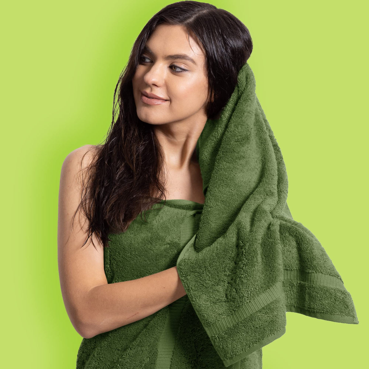 Chakir Turkish Linens moss hand towels folded close, highlighting spa-like softness and everyday durability.