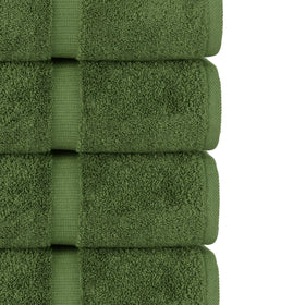 Chakir Turkish Linens moss hand towels on rack, emphasizing quick-dry performance and luxury feel.