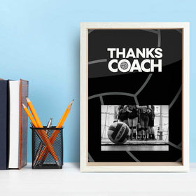 ChalkTalkSPORTS coach frame shown on a tabletop display with a team portrait.