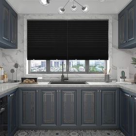 Changshade privacy and UV protection in living room with blackout shade.