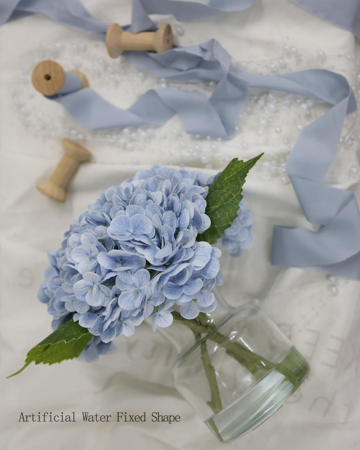 CHASMILE artificial hydrangea in vase adds color without watering.