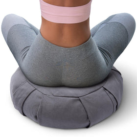 Cheer Collection meditation cushion demonstrates ergonomic posture support for seated practice.