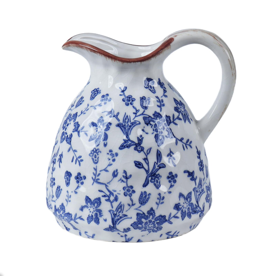 CheeryStow blue and white ceramic vase with handle displayed on a mantel for fresh blooms