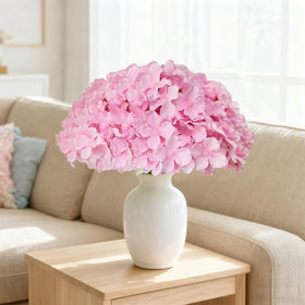 Cherica pink hydrangea artificial flowers in vases.