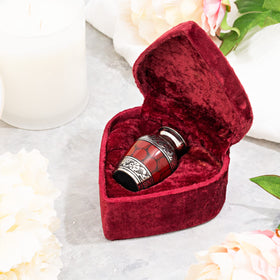 Cherishedly Yours hand-engraved mini urn highlighting artisan detail.
