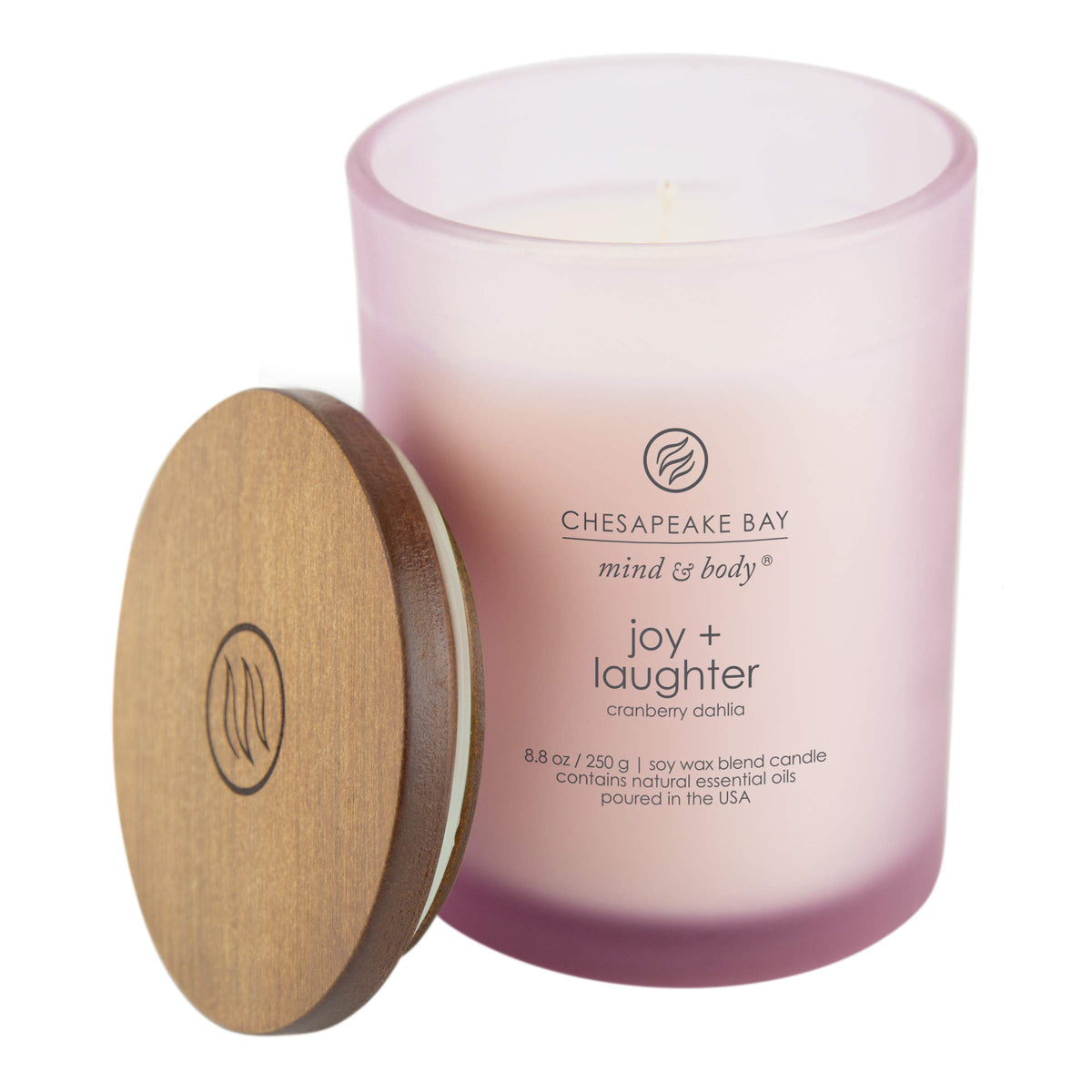 Chesapeake Bay Candle Joy and Laughter jar side view showing frosted glass and soft light.