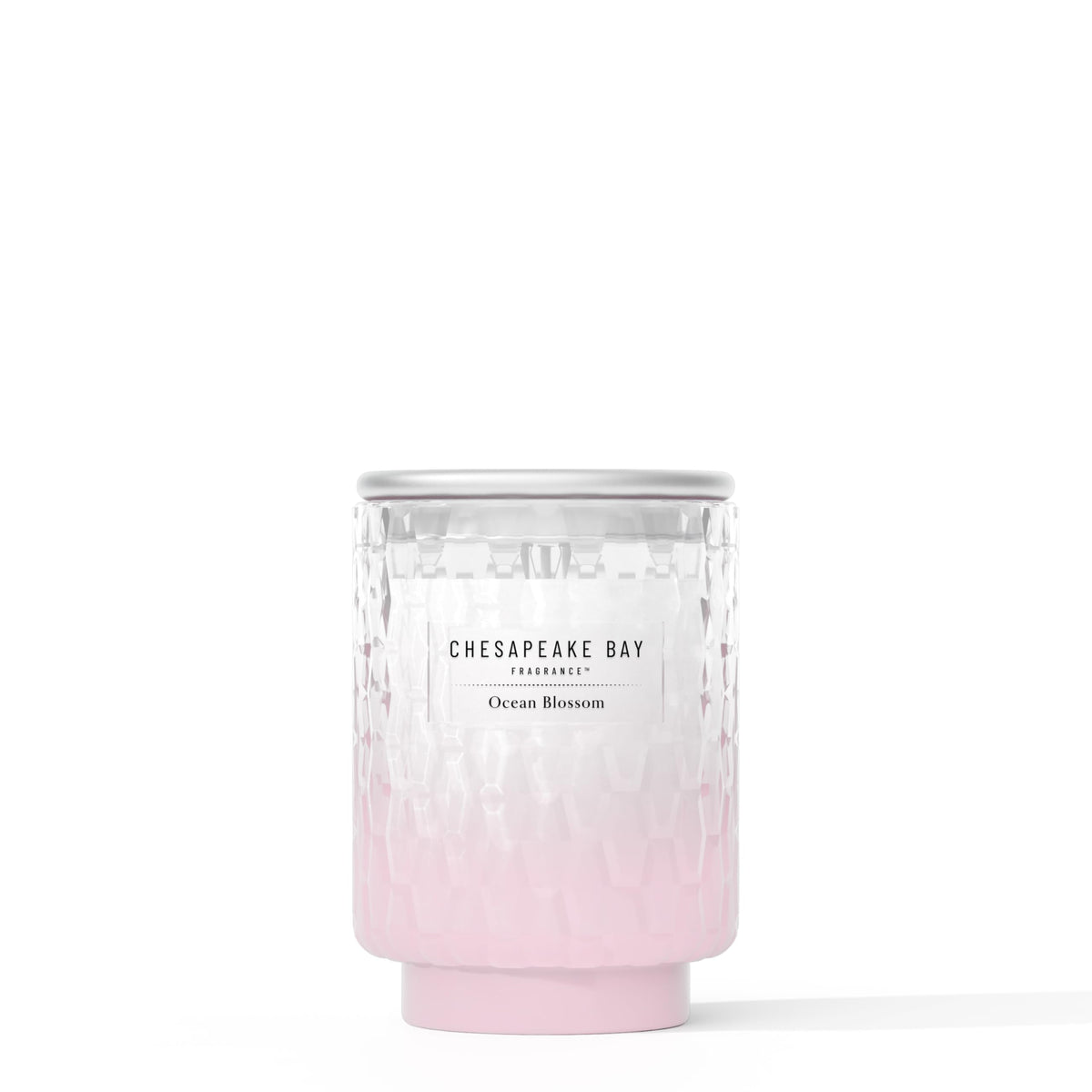 Chesapeake Bay Ocean Blossom candle jar with sea-glass texture enhances coastal decor.
