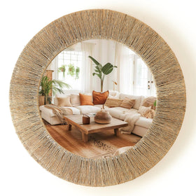 Chi An Home 24-inch natural jute round mirror enhances living room light.