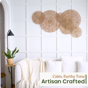 Chi An Home 15-inch wicker wall plate enhances bedroom decor with natural charm.