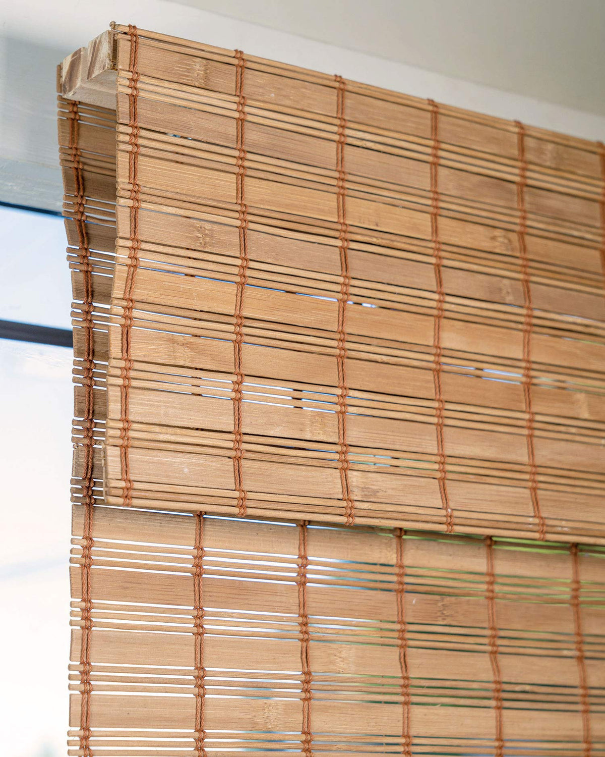 CHICOLOGY Bamboo Roman Shade showing natural bamboo texture for cozy interiors