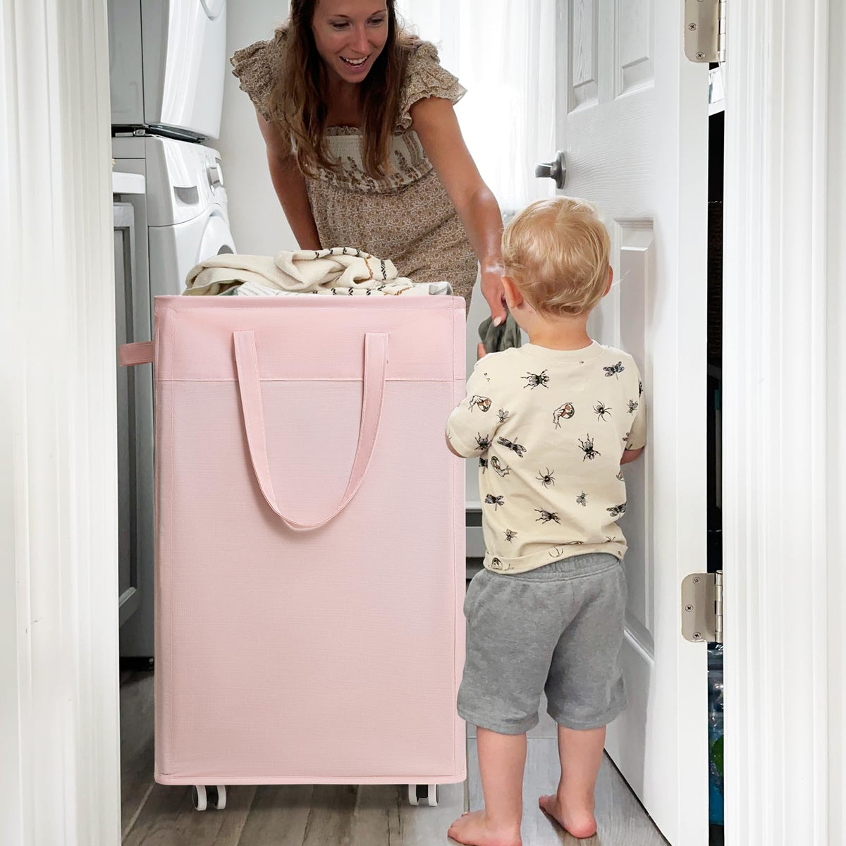 CHICVITA Pink Laundry Hamper in living room setting, ready for daily use.