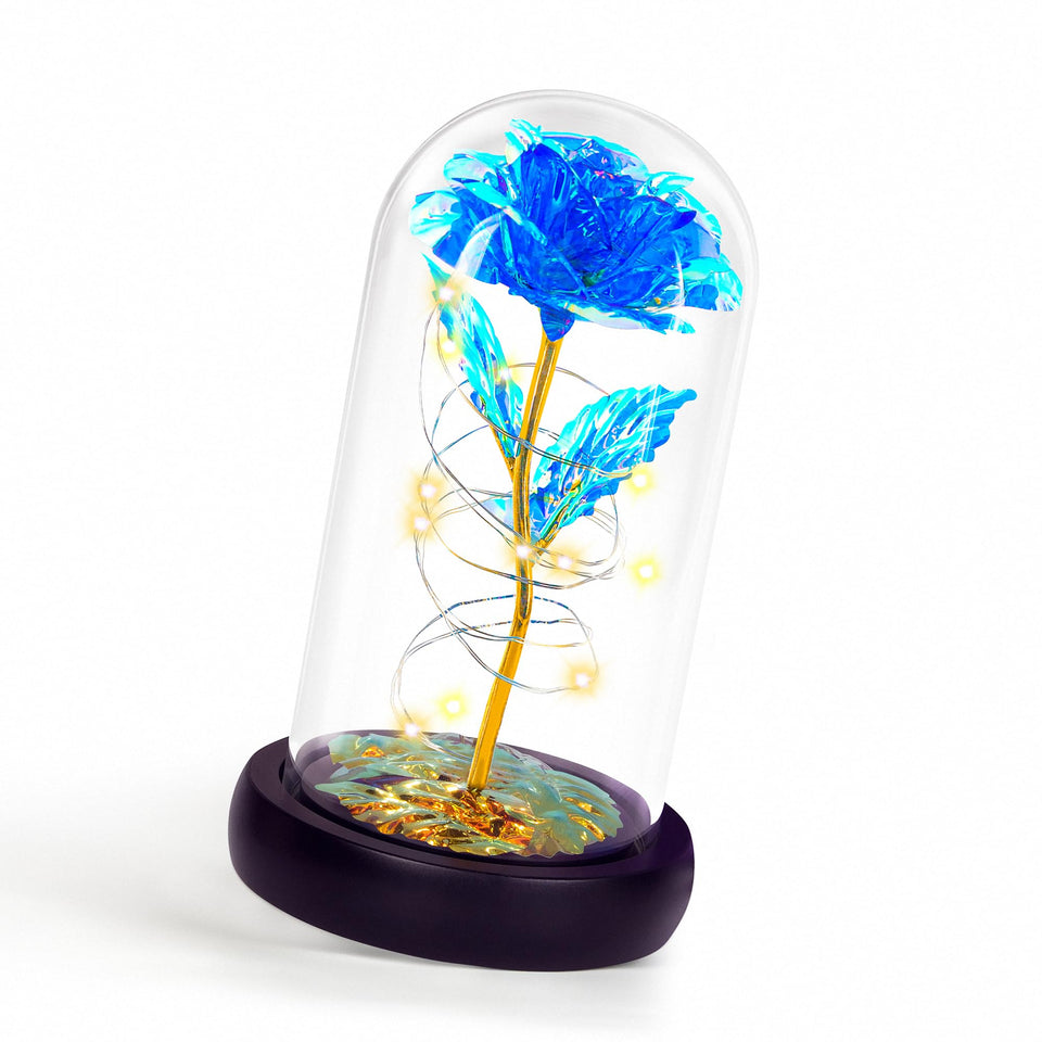 Childom blue rose in glass dome glowing softly for Mother's Day