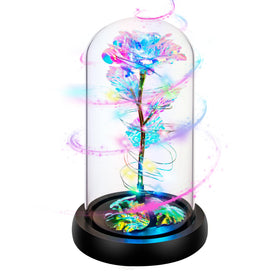 Childom rotating rose in a glass dome glows as a timeless keepsake