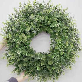 Chiyinbao 26in boxwood wreath on front door boosts curb appeal.