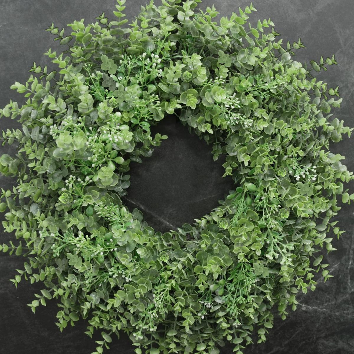 Chiyinbao boxwood wreath suits farmhouse style and seasonal celebrations.