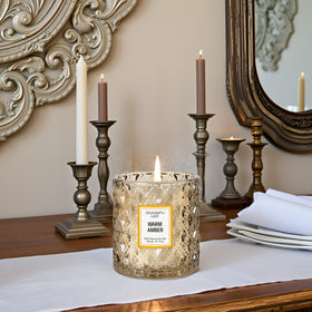Chloefu LAN Amber Candle in a bedroom creating ambience