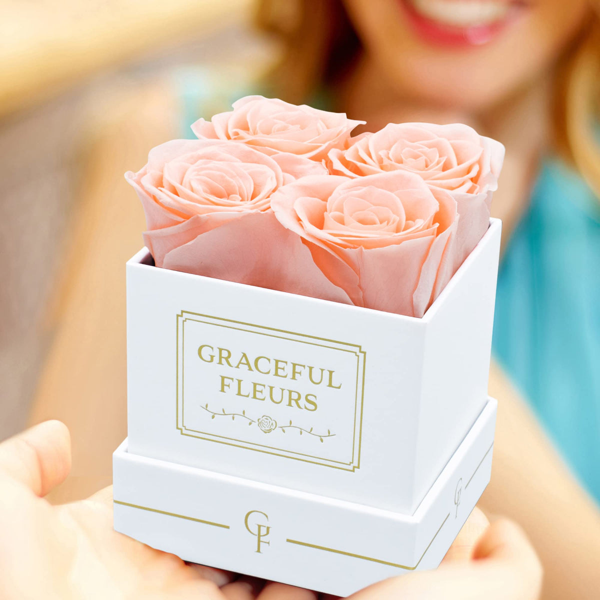 Bow-tied Graceful Fleurs box with four preserved roses, ideal Mother's Day gift